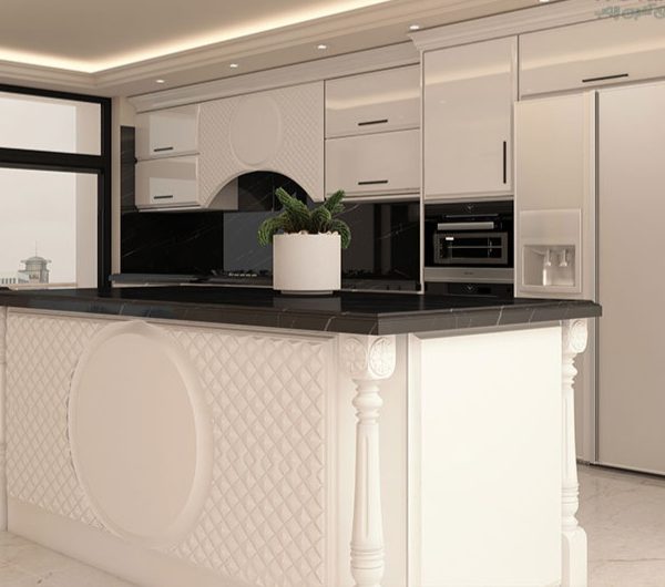 کابینت انزو کلاسیک با طراحی لاکچری، رنگ سفید براق، صفحه مشکی مقاوم و جزیره‌ای با حکاکی‌های زیبا، ایده‌آل برای آشپزخانه‌های مدرن و سلطنتی.